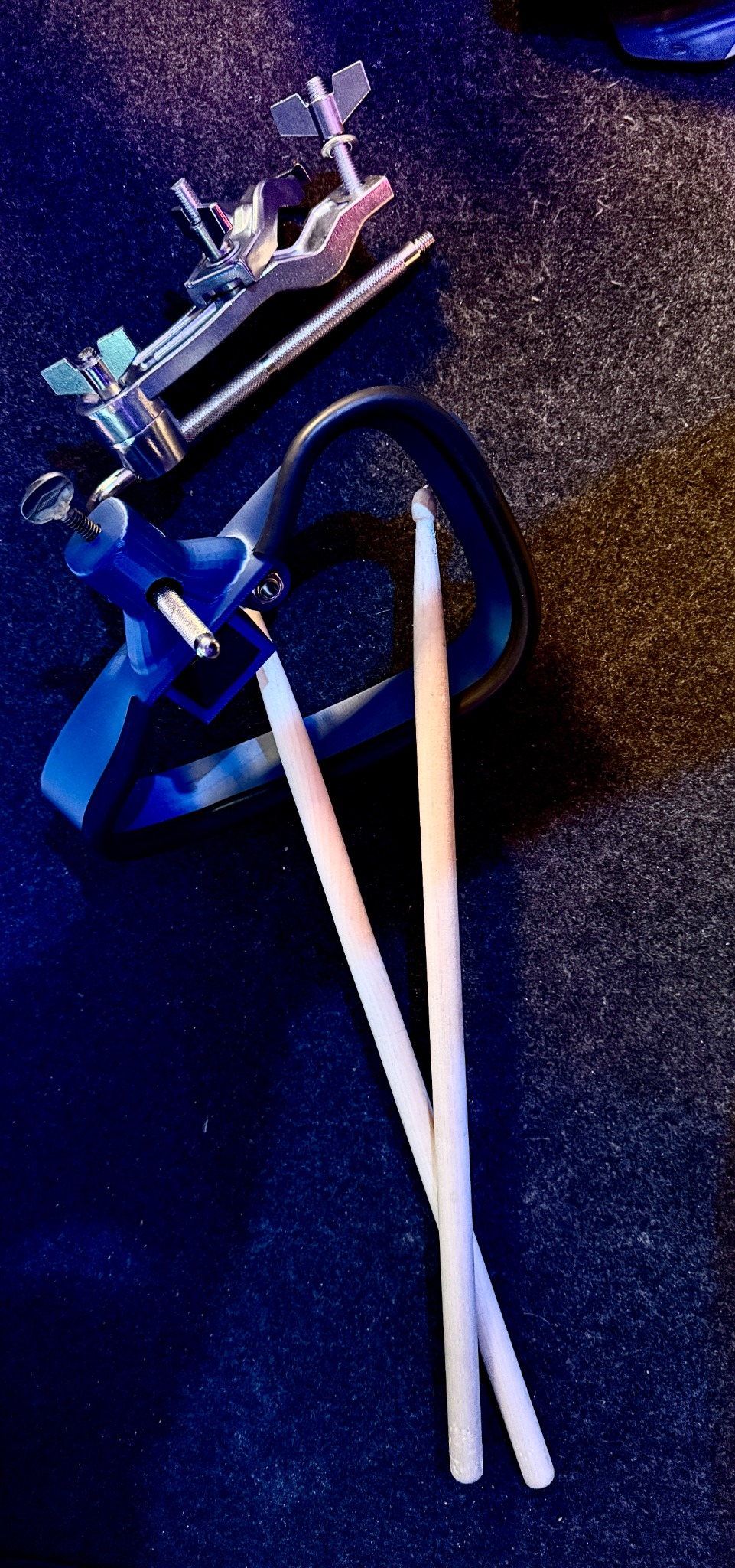 Modern tambourine trigger with drumsticks and mount